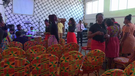 Vocalist-people-rehearsing-songs-inside-traditional-church-in-Ghana