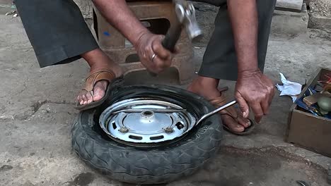 pov-shot-A-brother-is-fixing-a-tube-puncture