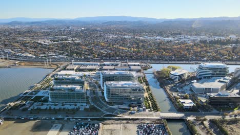 Stunning-drone-shot-over-Meta-Reality-Labs,-capturing-the-synergy-between-innovative-architecture-and-the-natural-landscape