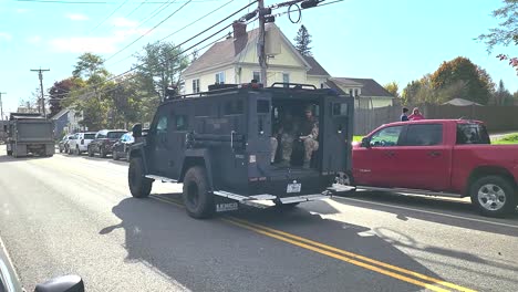 Armored-Police-Rescue-Vehicle-Storming-Down-Road-to-Track-Down-Mass-Shooter