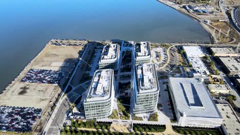 Stunning-drone-shot-over-Meta-Reality-Labs,-capturing-the-synergy-between-innovative-architecture-and-the-natural-landscape