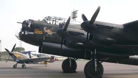 Avro-Lancaster-On-Display-at-Airshow-With-Spitfire-in-Background