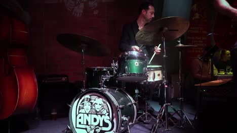 A-white-ambitious-musician-is-playing-drums-at-a-Chicago-restaurant-Andrews-jazz