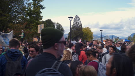 A-RIGHT-TO-LEFT-DOLLY-SHOT-of-a-Crowd-of-Climate-Change-Protesters-Congregating-at-Vancouver-City-Hall