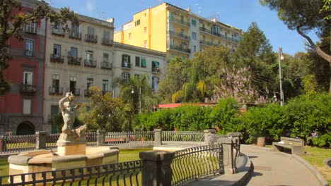 Baroque-Design-of-Fontana-del-Tritone-in-Piazza-Barberini,-Naples,-Italy-Wide