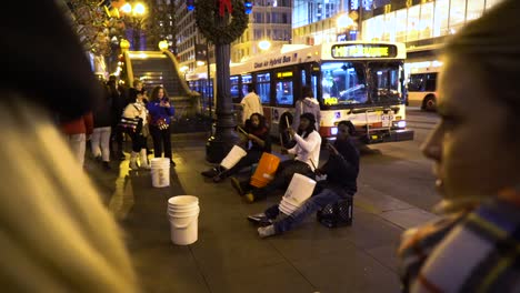 Two-white-woman-are-watching-street-performance