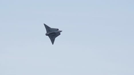 Underneath-View-of-Saab-Thirty-Five-Draken-Fighter-Jet-While-Banking-Mid-Flight