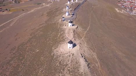 Drone-shot,-top-down-view,-satellite-style-over-old-windmills-in-the-area-of-Consuegra