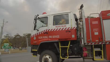 Emergency-services-responding-to-an-out-of-control-rural-fire-destroying-homes