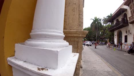 Close-up-of-a-colorful-red-door-close-to-a-street-in-the-old-town-of-Cartagena-de-Indias