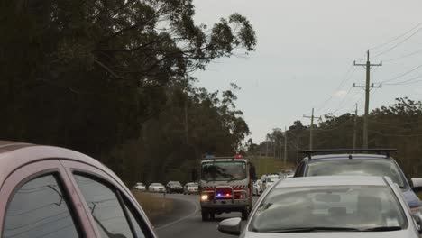 Emergency-services-responding-to-an-out-of-control-rural-fire-destroying-homes