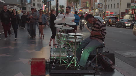 Street-Musician-plays-drum-kit-on-Hollywood-Blvd-Walk-of-Fame