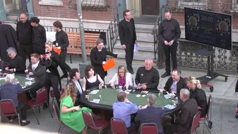 poker-players-relaxing-at-tables