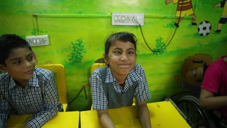 Super-cute-NGO-primary-school-children-smiling-at-front-of-the-camera,-Right-to-Education