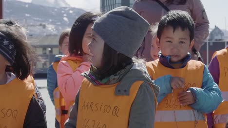 Primary-School-Children-Lined-Up-Outside-In-Playground