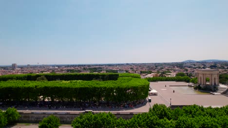 Aerial-establishing-shot-of-LGBTQ+-protesters-protesting-in-a-park