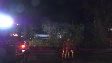 firefighters-mop-up-fire-scene