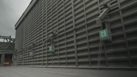 Follow-Shot-Alongside-Of-Large-Wheat-Grain-Store