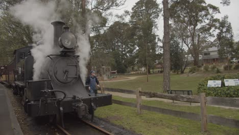 Historic-'Puffing-Billy'-steam-train-releasing-steam-at-Gembrook-Station