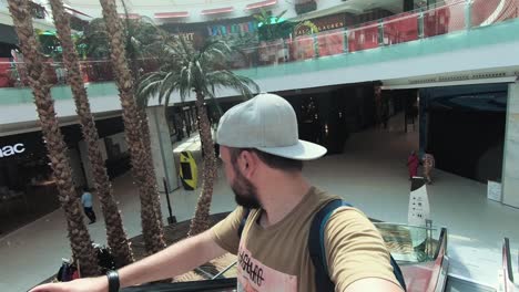 Traveler-going-up-on-the-stairs-in-the-Morocco-Mall-of-Africa---Casablanca