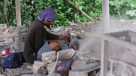 Workers-cut-the-stone-and-smooth-it-with-a-grinder