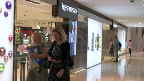 Shoppers-walk-past-the-Swiss-high-end-and-world-leader-in-coffee-capsules-brand-store-Nespresso-in-Hong-Kong