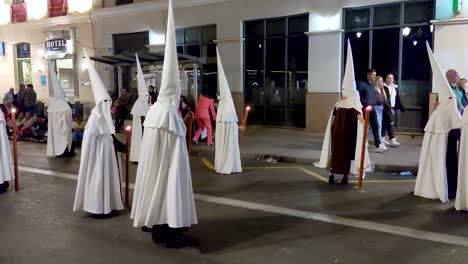 Semana-Santa-Easter-holy-week-parades-in-the-thin-streets-of-Malaga,-Spain