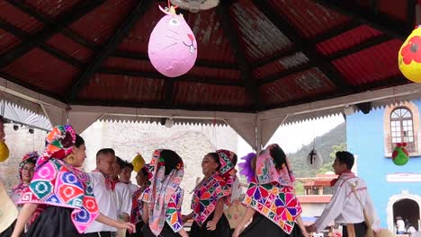 shot-of-traditional-dance-in-couples-with-traditional-peasant-attire-in-Mexico