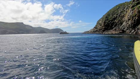 Bruny-Island,-Tasmania,-Australia---15-March-2019:-Two-tourist-boats-and-passengers-enjoying-the-scenery-around-Bruny-Island-in-Tasmania-Australia