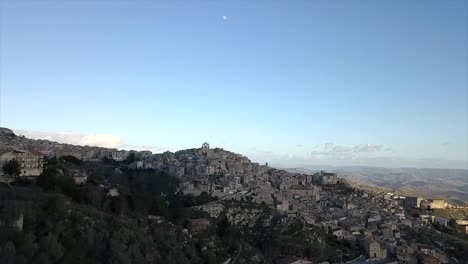 Drone-shot-of-the-town-of-Mussomeli,-the-town-in-Sicily-where-houses-are-for-sale-at-1-Euro