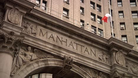 Archway-With-Manhattan-Engraved-In-Stone-Above-Archway