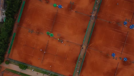 Drone-aerial-forward-flying-bird-eye-view-of-coastline-Portoroz-town-ATP-Challenger-Slovenia-Open-tennis-grounds