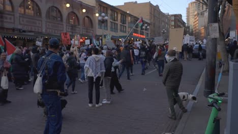 Protestors-march-while-photographer-takes-picturs