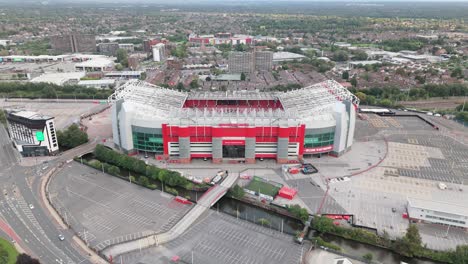 Wharfside-Way-With-Old-Trafford-Football-Stadium-In-Manchester,-England,-UK