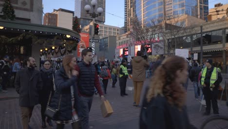 Protestors-march-while-man-speaks-into-megaphone