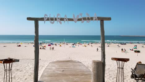 Pura-Vida-sign,-entrance-of-the-Praira-da-Barra-beach-in-Gafanha-da-Nazaré,-Portugal