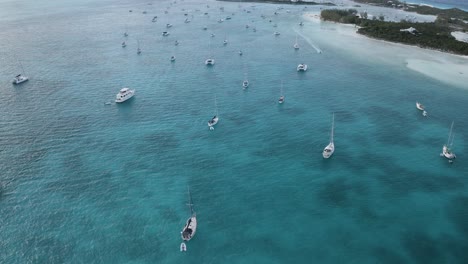 Sailboats-Anchored-at-Tropical-Boat-Harbour-Marina,-Top-Down-Aerial-View