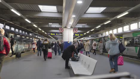 Multiple-passengers-arriving-Euston-Station-on-trains-head-for-the-exit