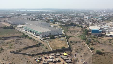 aerial-drone-shot-Industrial-area-has-lots-of-industries-around-and-lots-of-shacks-are-visible