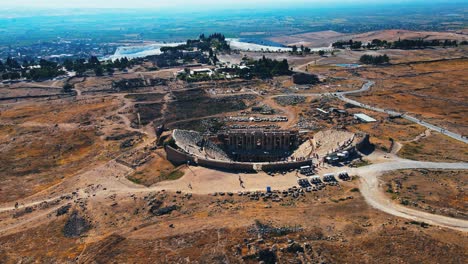 Aerial-4K-drone-video-of-the-Ancient-theater-of-the-Roman-city-of-Hierapolis-in-Pamukkale,-Turkey