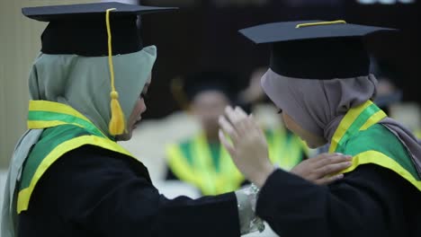 Preparation-for-college-graduates-to-tidy-up-each-other's-friends-to-attend-the-graduation-ceremony