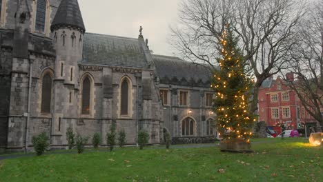 Pan-shot-of-Christ-Church-Cathedral-during-the-end-of-the-year-on-a-cloudy-day-in-Dublin,-Ireland