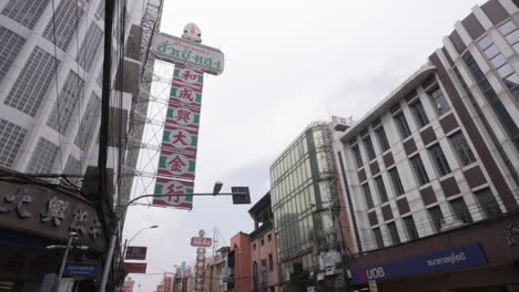 Busy-Streets-with-Traffic-in-Chinatown-in-Bangkok,-Thailand