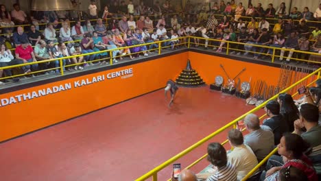 POV-SHOT-Filming-a-person-performing-an-acrobatics-in-an-arena