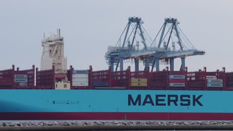 Maersk-cargo-ship-being-loaded-with-containers