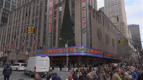 People-walking-around-Rdio-City-Music-Hall-in-New-York-City