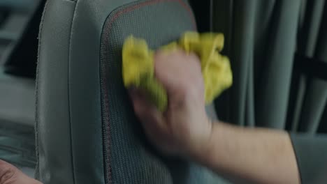 Semi-Truck-Seat-Gets-Cleaned-with-yellow-microfiber-towel-a-Volvo-Truck