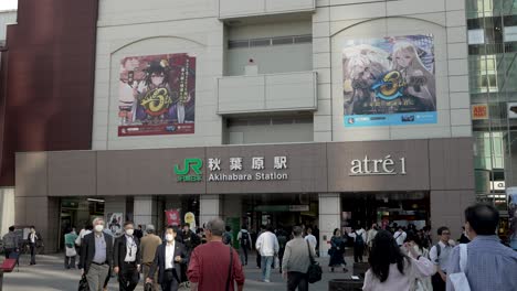 Commuters-And-People-Walking-In-And-Out-Of-To-Entrance-To-JR-Akihabara-Station-In-Tokyo