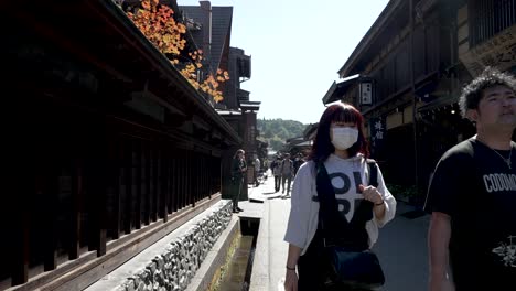 Tourists-Walking-Through-Historical-Old-Town-Street