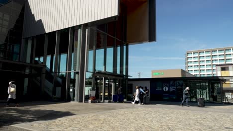 Commuters-Entering-East-Side-of-Takayama-Station-On-Sunny-Afternoon